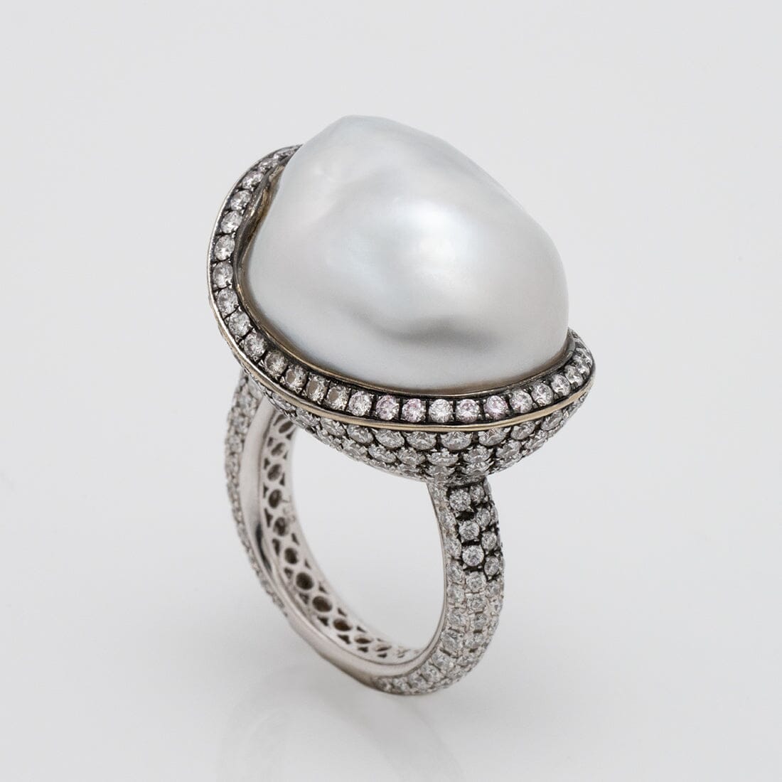Assael Collection: 22.2 x 18.1 x 17.0 mm Baroque White South Sea Pearl and Diamond Ring featuring a large baroque white pearl accented by a pavé diamond halo and band in exquisite fine jewelry design.