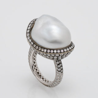 Assael Collection: 22.2 x 18.1 x 17.0 mm Baroque White South Sea Pearl and Diamond Ring featuring a large baroque white pearl accented by a pavé diamond halo and band in exquisite fine jewelry design.