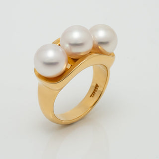 Elegant gold band ring featuring three lustrous white Akoya pearls, showcasing classic sophistication in the Assael Collection: 8.0–8.5 mm Akoya Three-Pearl Ring.