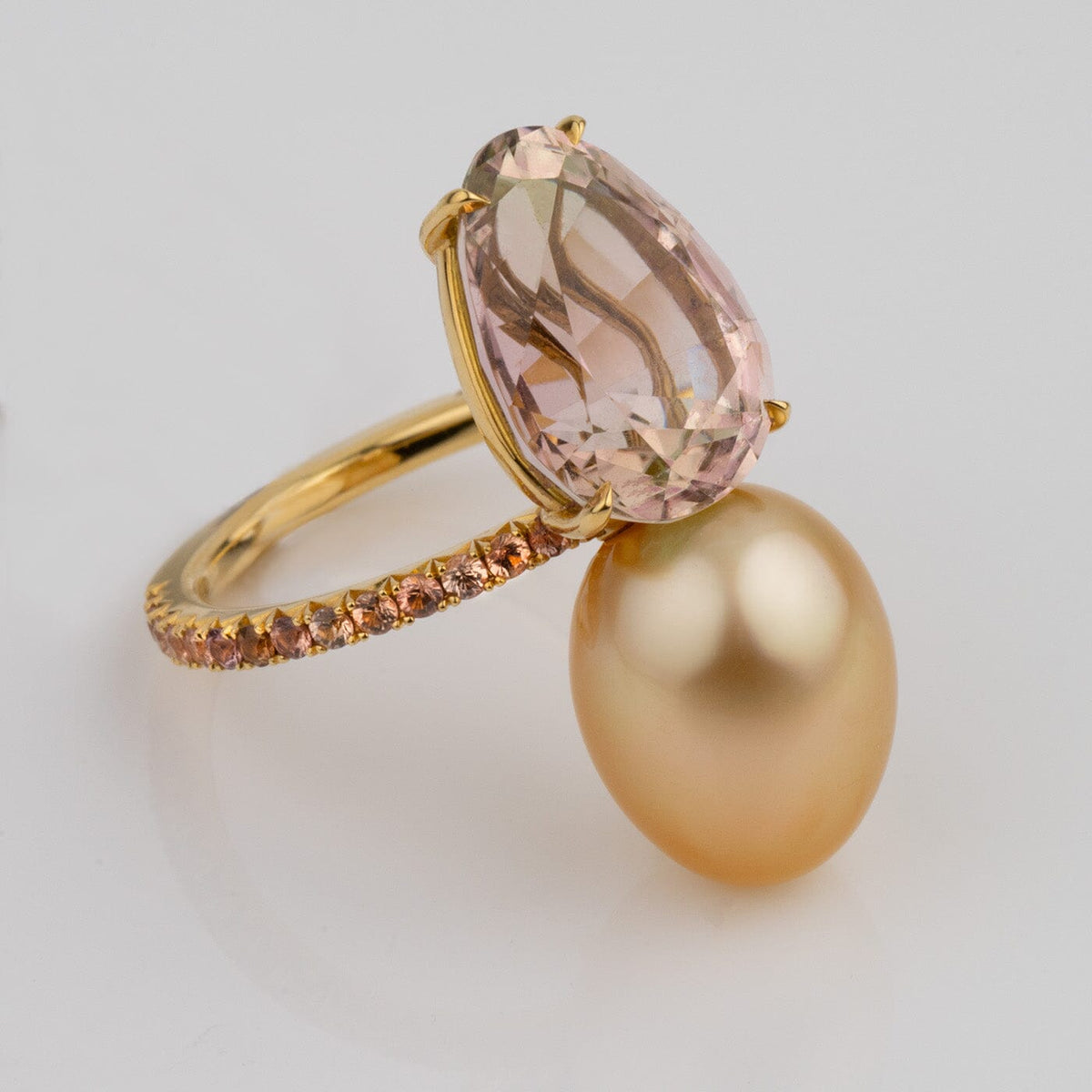 Assael Collection: 10.9x14.2 mm Golden South Sea Pearl, Tourmaline & Yellow Sapphire Ring featuring a lustrous golden pearl and large faceted tourmaline on a yellow sapphire accented band