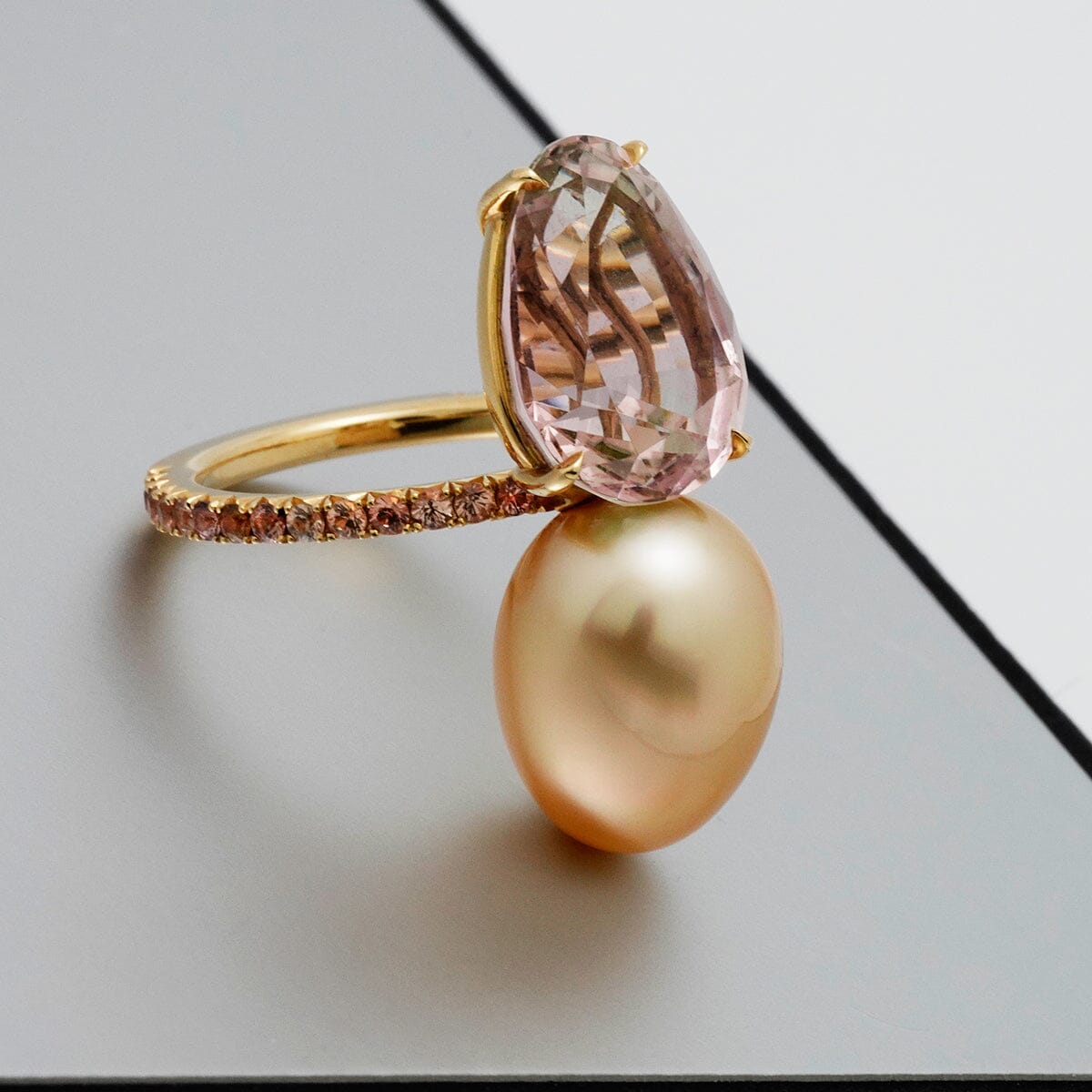 Assael Collection: 10.9x14.2 mm Golden South Sea Pearl, Tourmaline & Yellow Sapphire Ring featuring a lustrous golden pearl, pink tourmaline gemstone, and yellow sapphire accents on a delicate gold band.