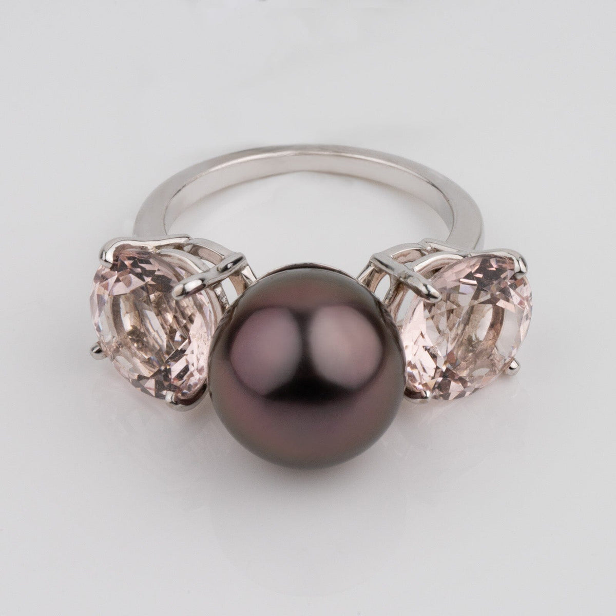 Assael Collection: 11.2 mm Tahitian Pearl and Morganite Ring featuring a lustrous dark Tahitian pearl flanked by two sparkling morganite gemstones on a polished 14K white gold band