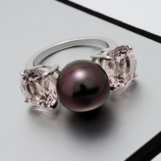 Assael Collection: 11.2 mm Tahitian Pearl and Morganite Ring featuring a large dark Tahitian pearl flanked by two light pink Morganite gemstones set in a polished 14K white gold band.