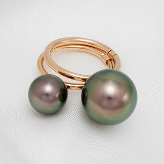 Assael Collection: 10.1 and 14.2 mm Tahitian Pearl Ring featuring two lustrous black and green pearls set on elegant rose gold bands, showcasing fine cultured pearl craftsmanship.