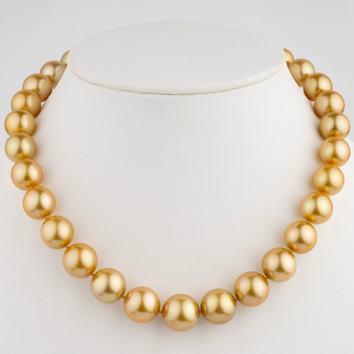 Exceptional Golden South Sea pearl necklace, 31 round pearls 11.5–15.0 mm. Superb luster, natural golden color, on bust
