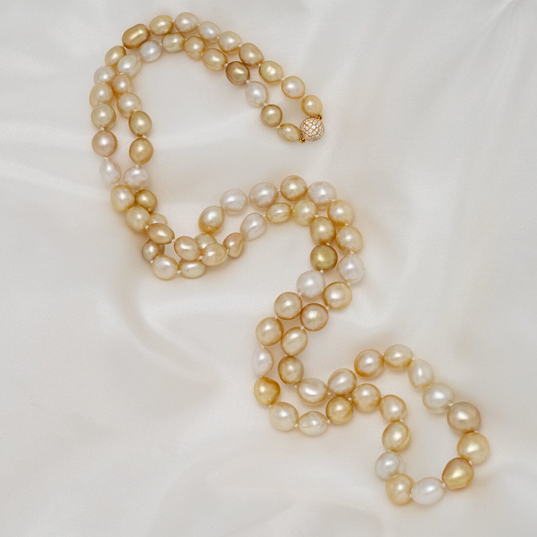 7.8–11.1 mm mixed South Sea keshi pearl and diamond necklace
81 mixed South Sea keshi pearls · 23.9 momme · approx. 35 inches