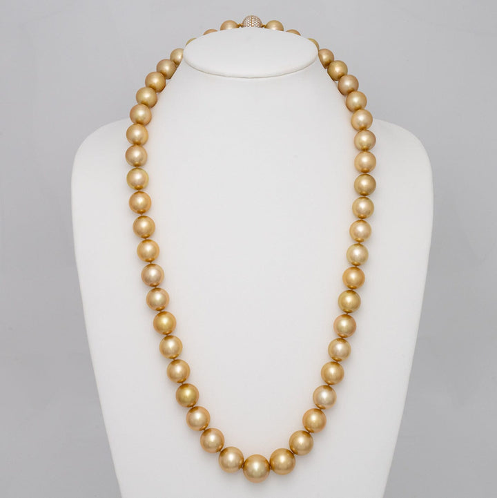 14.0–17.7 mm round golden South Sea pearl and diamond necklace on bust