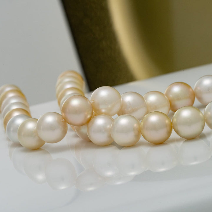 11.6–12.4 mm round multicolor golden and white South Sea pearl necklace