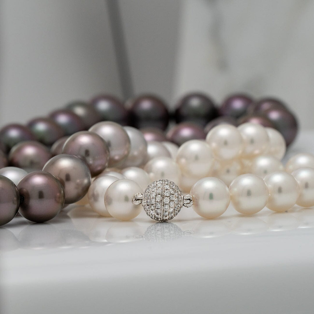 77 round pearls · 38.5 momme · approx. 35 inches · 18K white gold and diamond clasp · 112 diamonds, 0.80 cttw