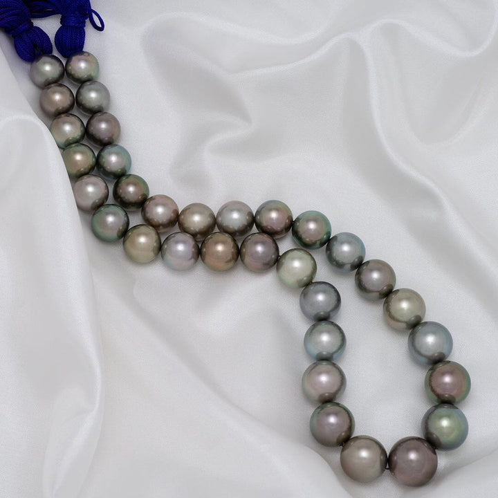 A striking multicolor 12.5–16.5 mm round Tahitian pearl necklace featuring large natural color pearls