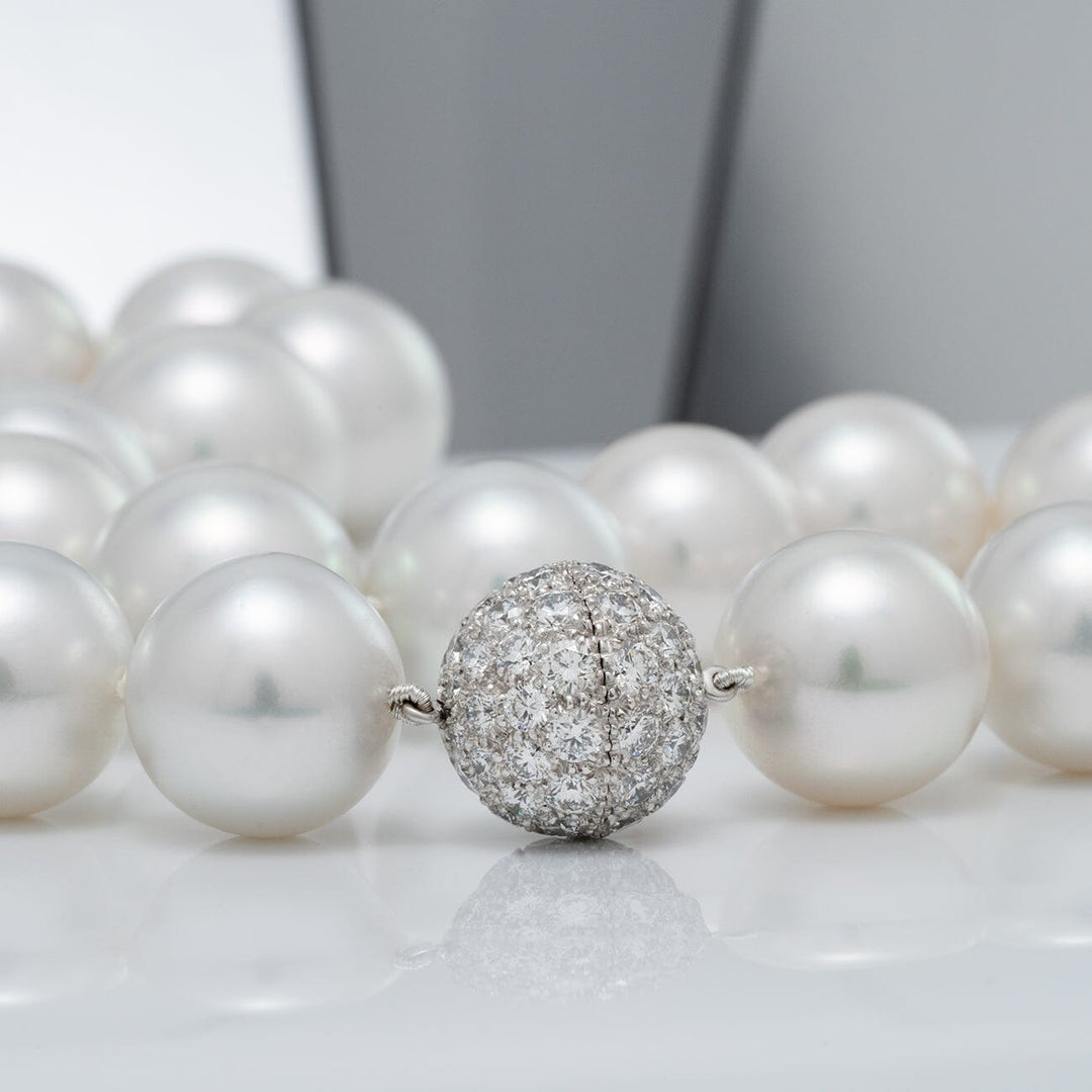 platinum and 18K white gold diamond ball clasp (72 diamonds, 6.29 ctw)
