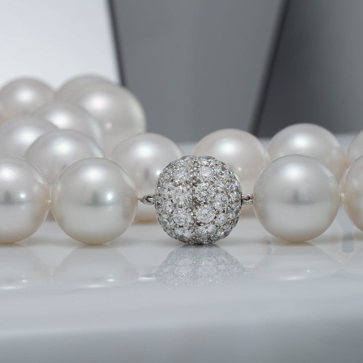 platinum and 18K white gold diamond ball clasp (60 diamonds, 8.49 ctw)
