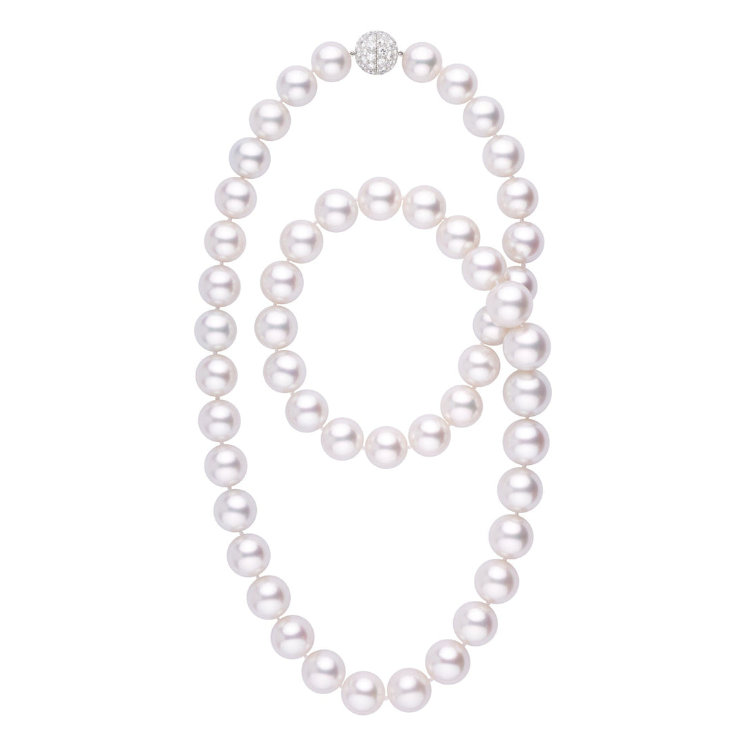 Museum-grade white South Sea pearl necklace, 50 round pearls 15.0–18.5 mm, 82.0 momme. Subtle pink overtones, platinum clasp with 7.60 ct diamonds.