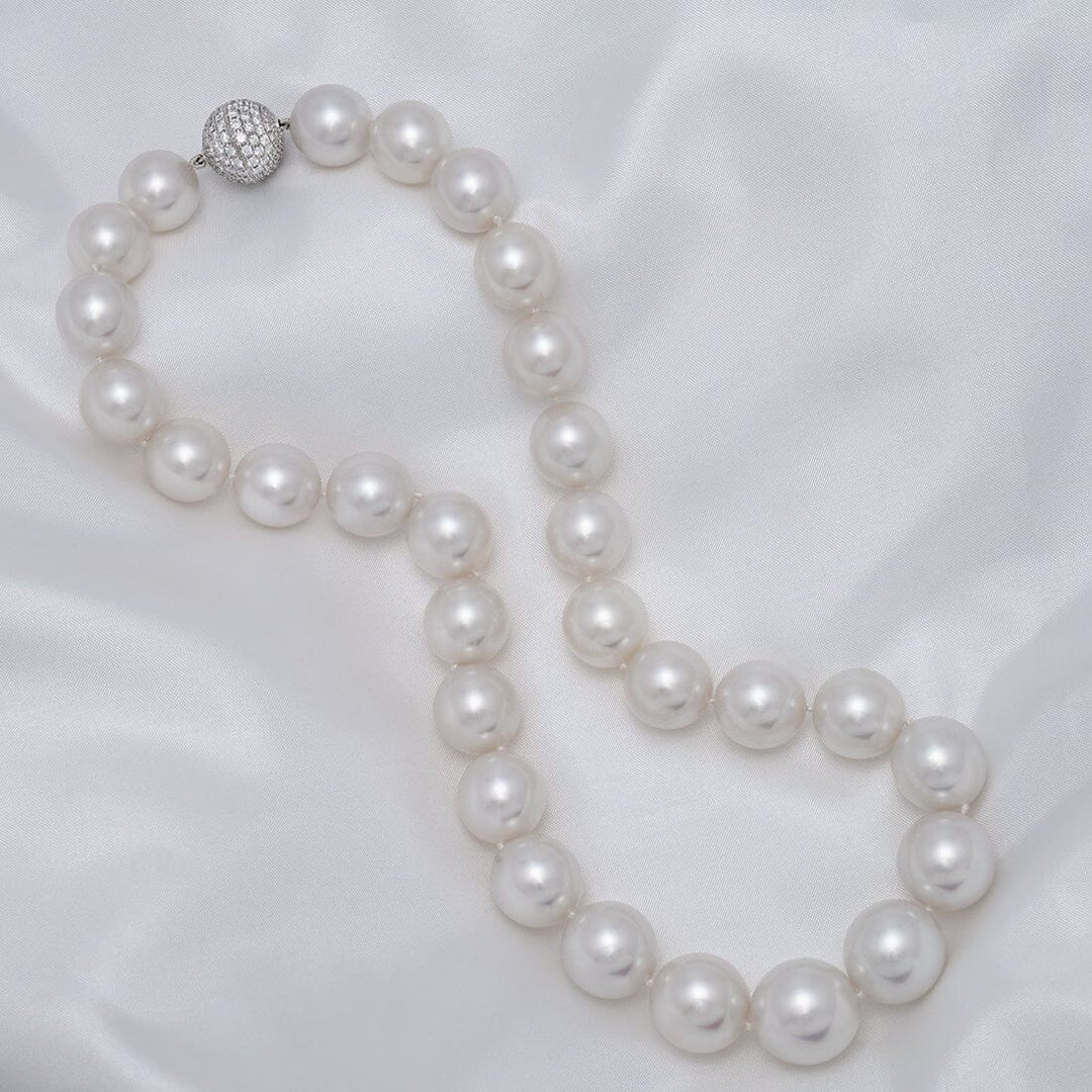13.0–15.8 mm round to near-round South Sea pearl and diamond necklace