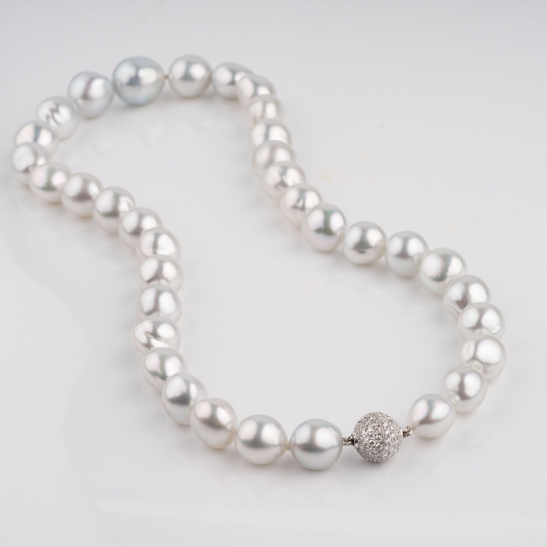 Semi-baroque South Sea pearl necklace, 35 pearls 9.8–14.3 mm with 18k WG diamond clasp.