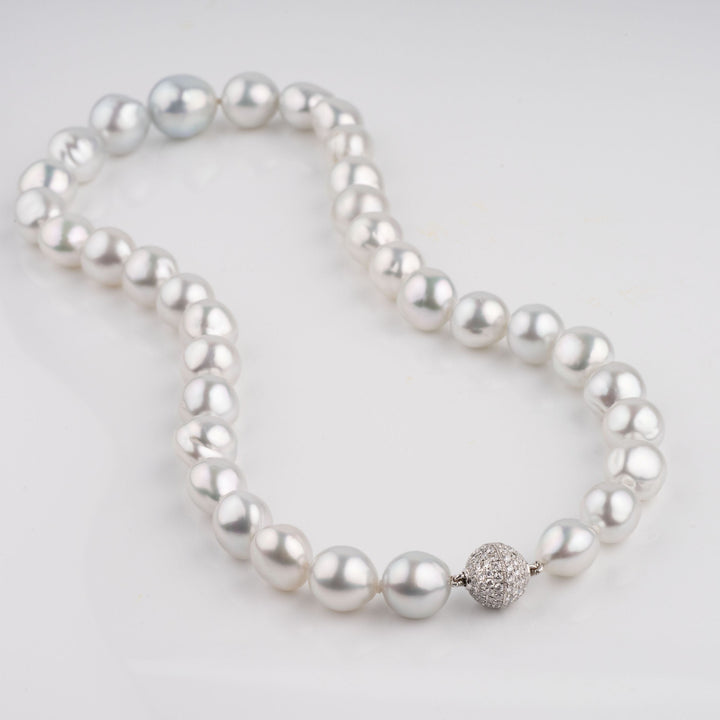 Semi-baroque South Sea pearl necklace, 35 pearls 9.8–14.3 mm with 18k WG diamond clasp.