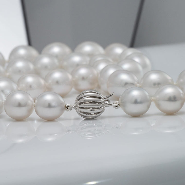 Oval South Sea pearl necklace featuring 35 luminous pearls with refined white luster, finished with an 18K white gold clasp. 