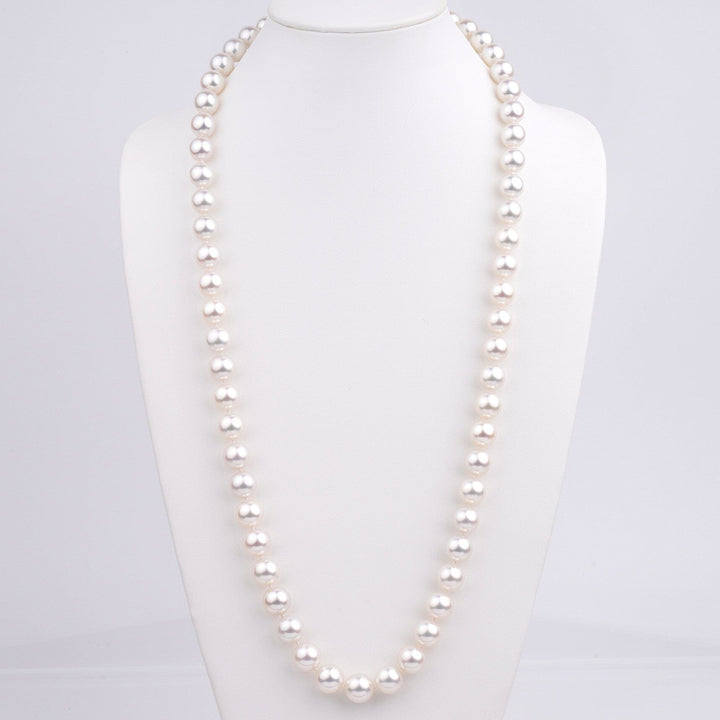 South Sea pearl necklace, 62 round pearls 12.0–14.0 mm, 49.9 momme. Superb luster, natural color on bust