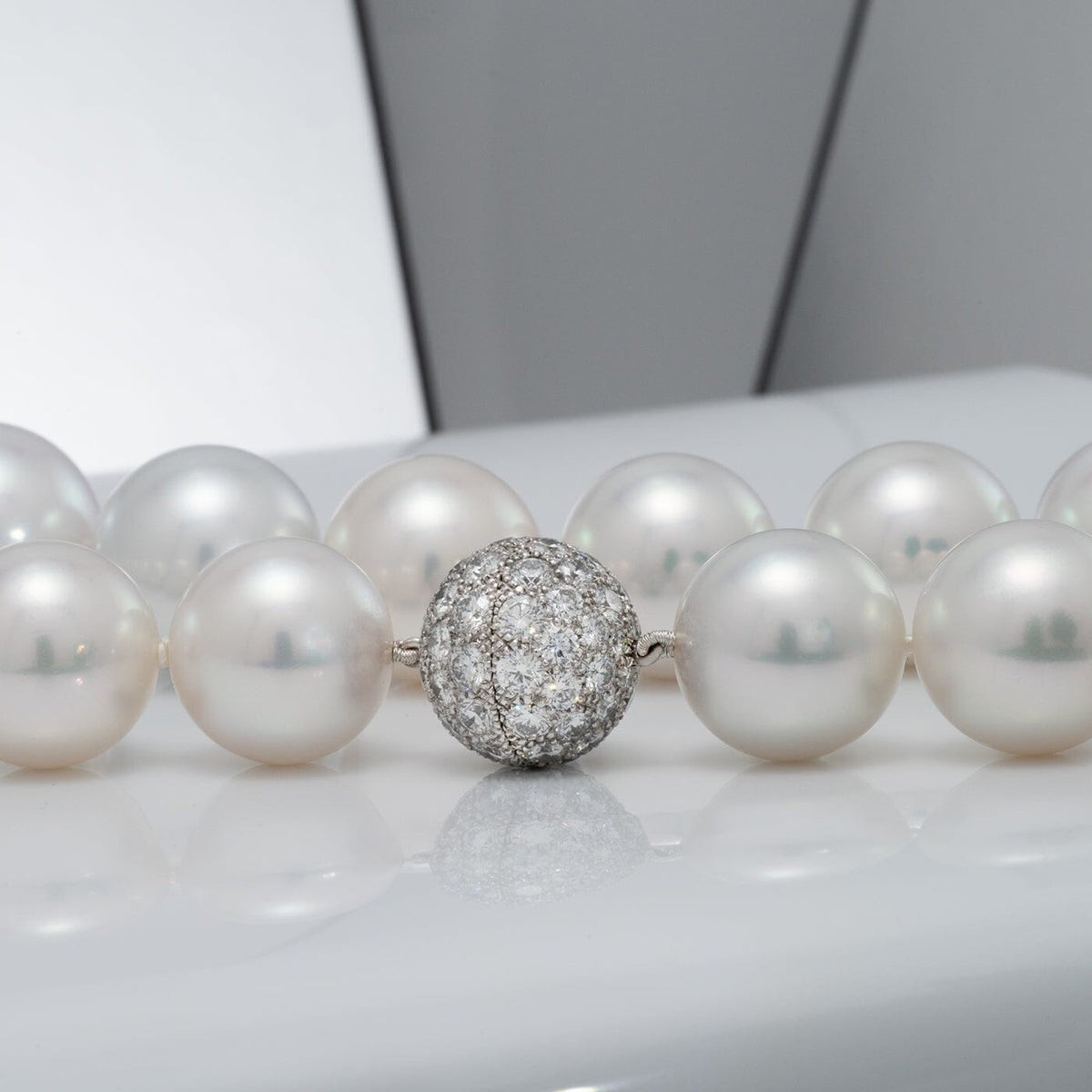 platinum and 18K white gold diamond ball clasp (72 diamonds, 6.44 ctw)