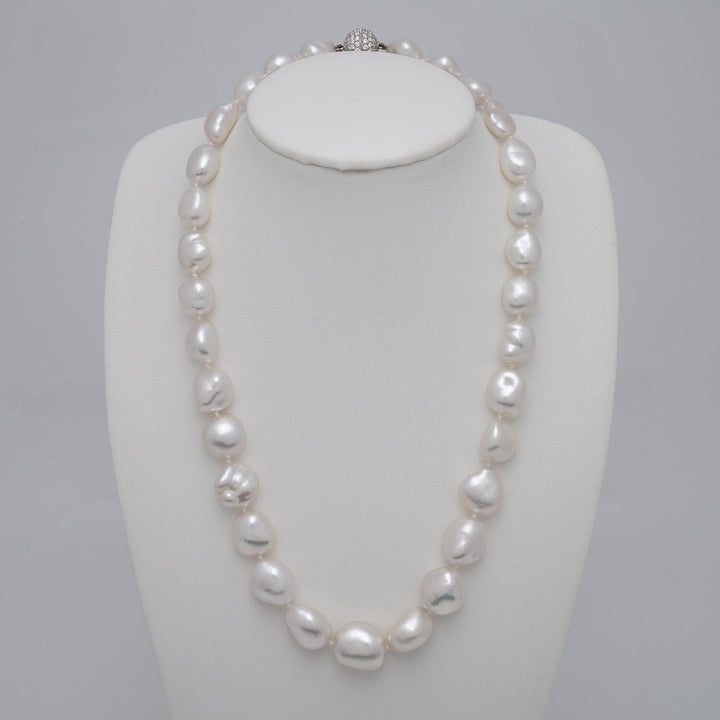 White South Sea Keshi Pearl Necklace, 31 pearls, 11.1–14.9 mm, 19.9 momme on bust