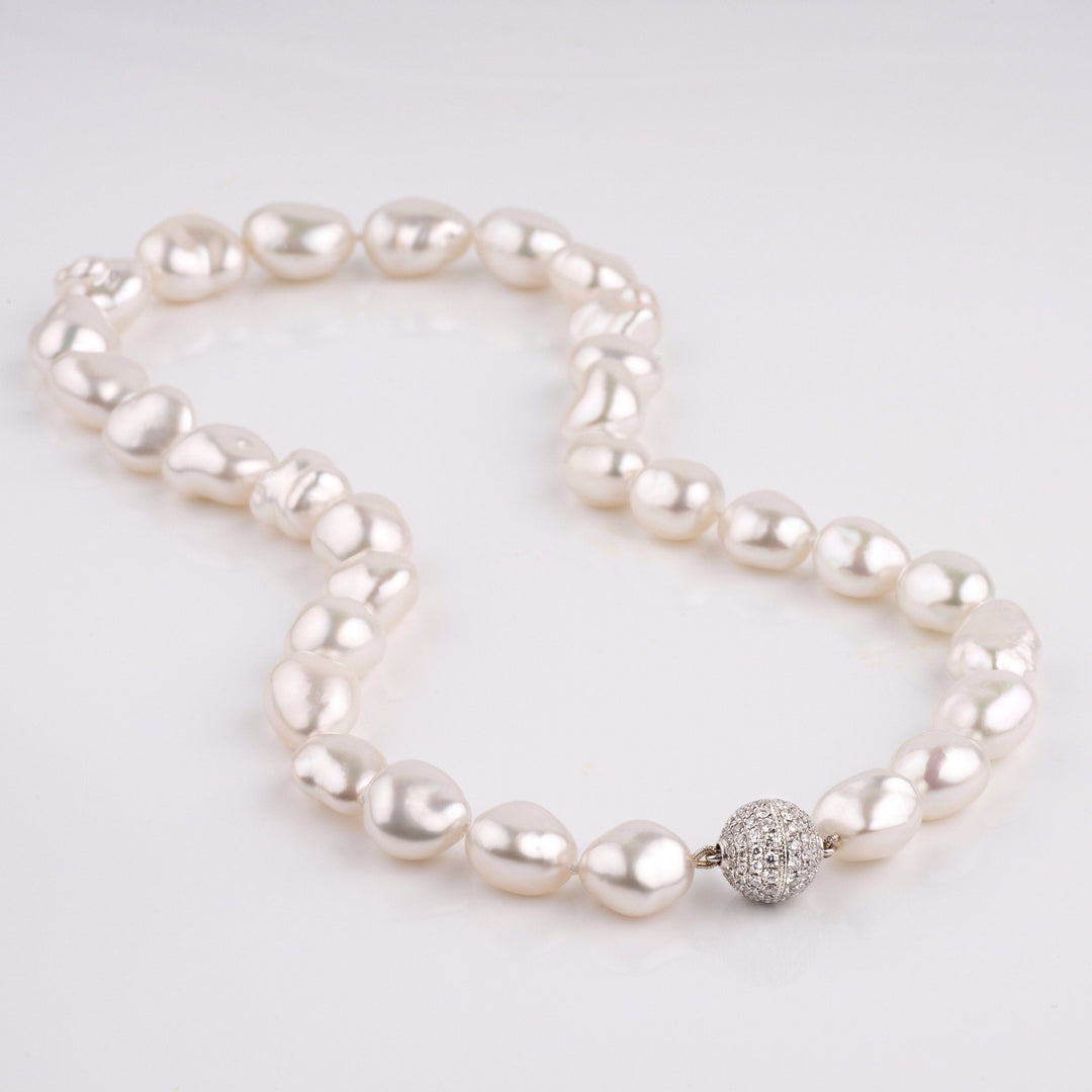 White South Sea Keshi Pearl Necklace, 31 pearls, 11.1–14.9 mm, 19.9 momme, 1.32 cttw diamond clasp layout
