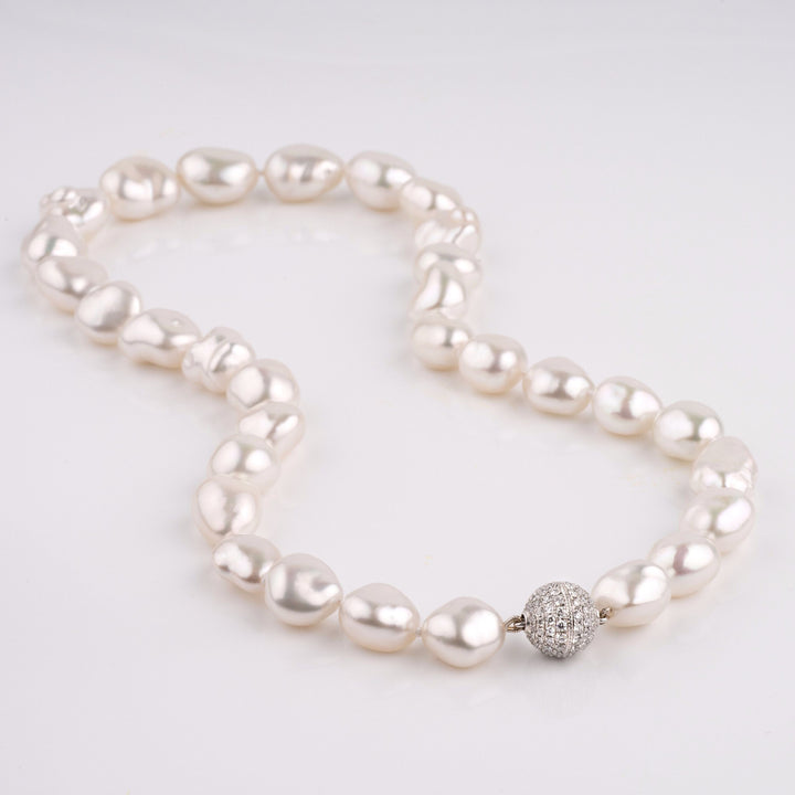 White South Sea Keshi Pearl Necklace, 31 pearls, 11.1–14.9 mm, 19.9 momme, 1.32 cttw diamond clasp layout