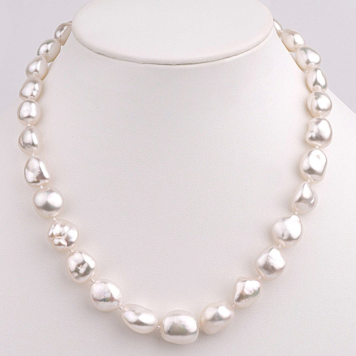 White South Sea Keshi Pearl Necklace, 31 pearls, 11.1–14.9 mm, 19.9 momme on bust