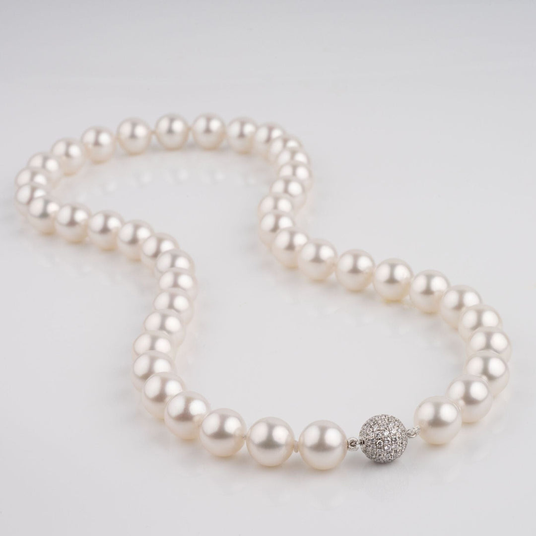 9.1 to 10.0mm AAA White South Sea Round Pearl Necklace laid out