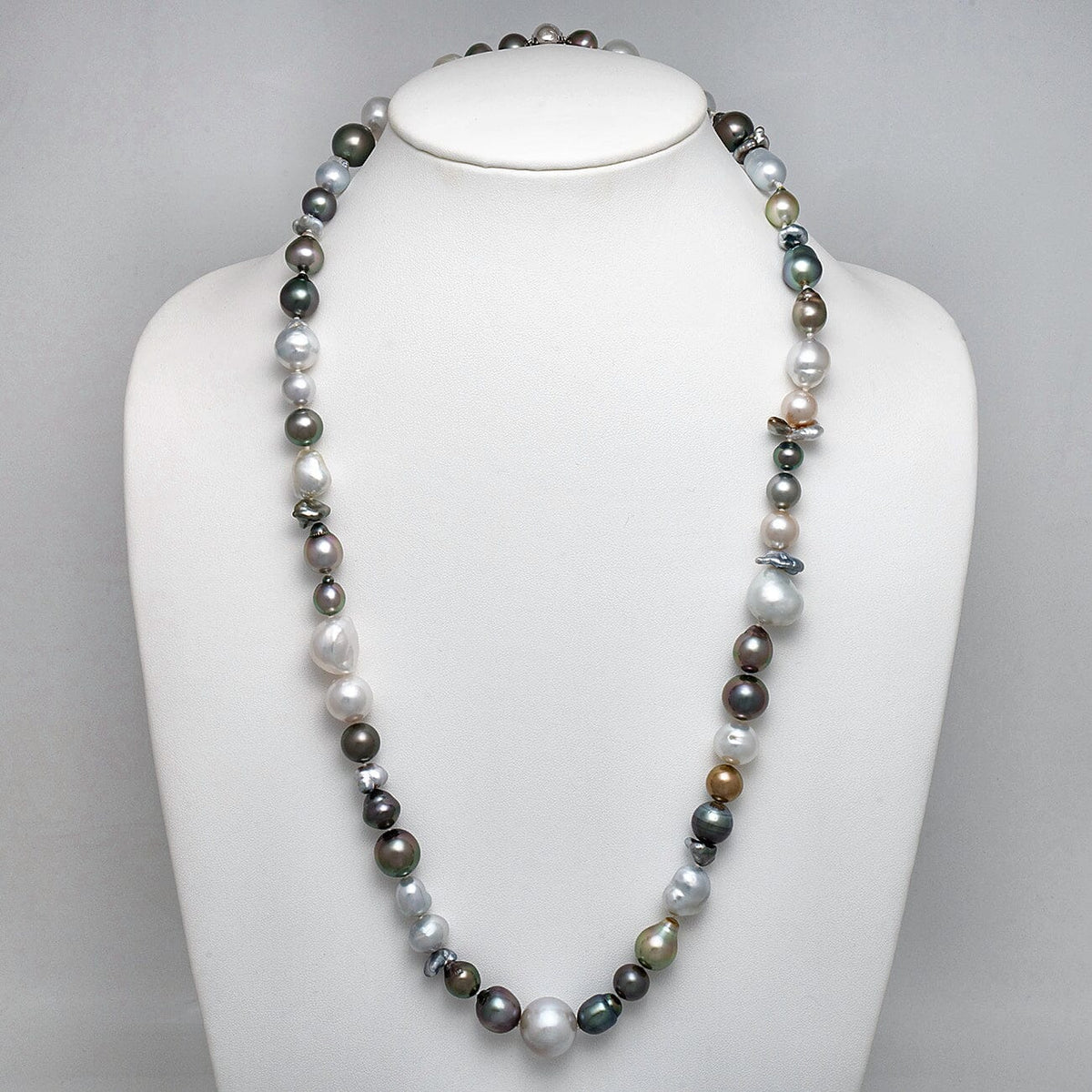 8.0-15.0 mm Baroque and Keshi South Sea and Tahitian Pearl Opera Necklace on a dark background