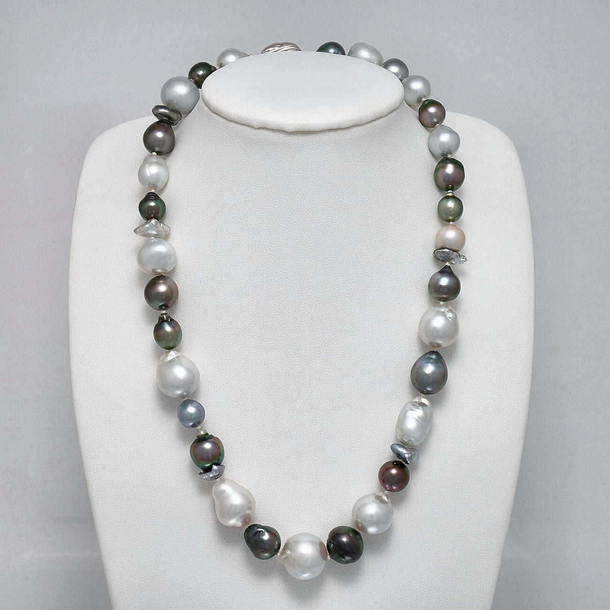 8.0-15.0 mm Baroque and Keshi South Sea and Tahitian Pearl Necklace on a dark background