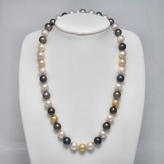 9.1-10.8 mm Round Multicolor South Sea and Tahitian Pearl Necklace on a dark background