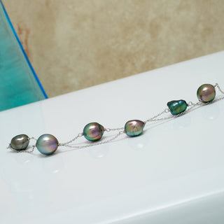TC-11: 8.0-10.5 mm Tahitian Keshi and Drop Tin Cup Pearl Necklace livestream, view 2