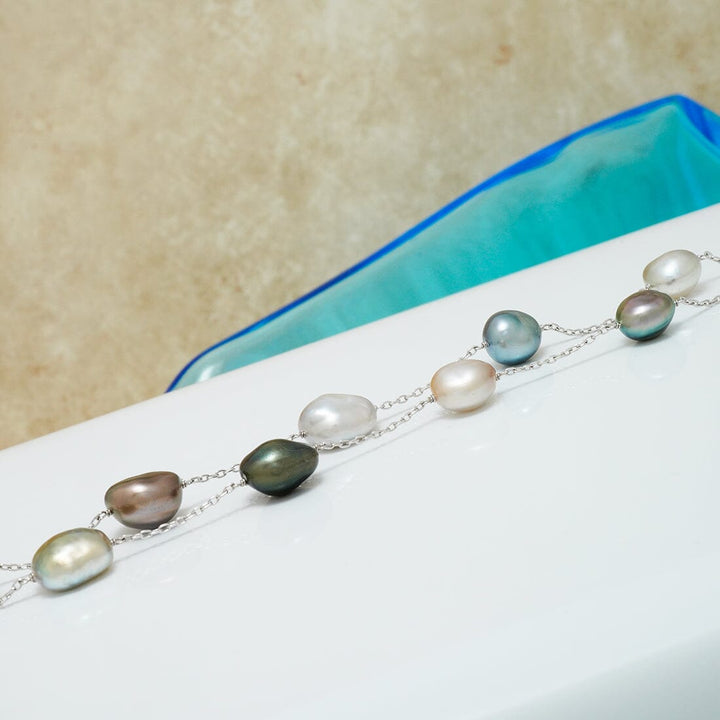 TC-28: 10.3-12.5 mm Fijian Keshi Pearl Tin Cup Necklace, 18", 14K