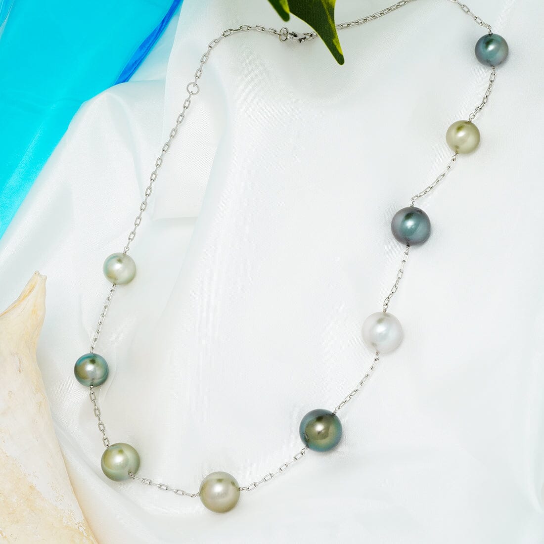 TC-35: 11.2-14 mm Fijian Pearl Tin Cup Necklace, view 2