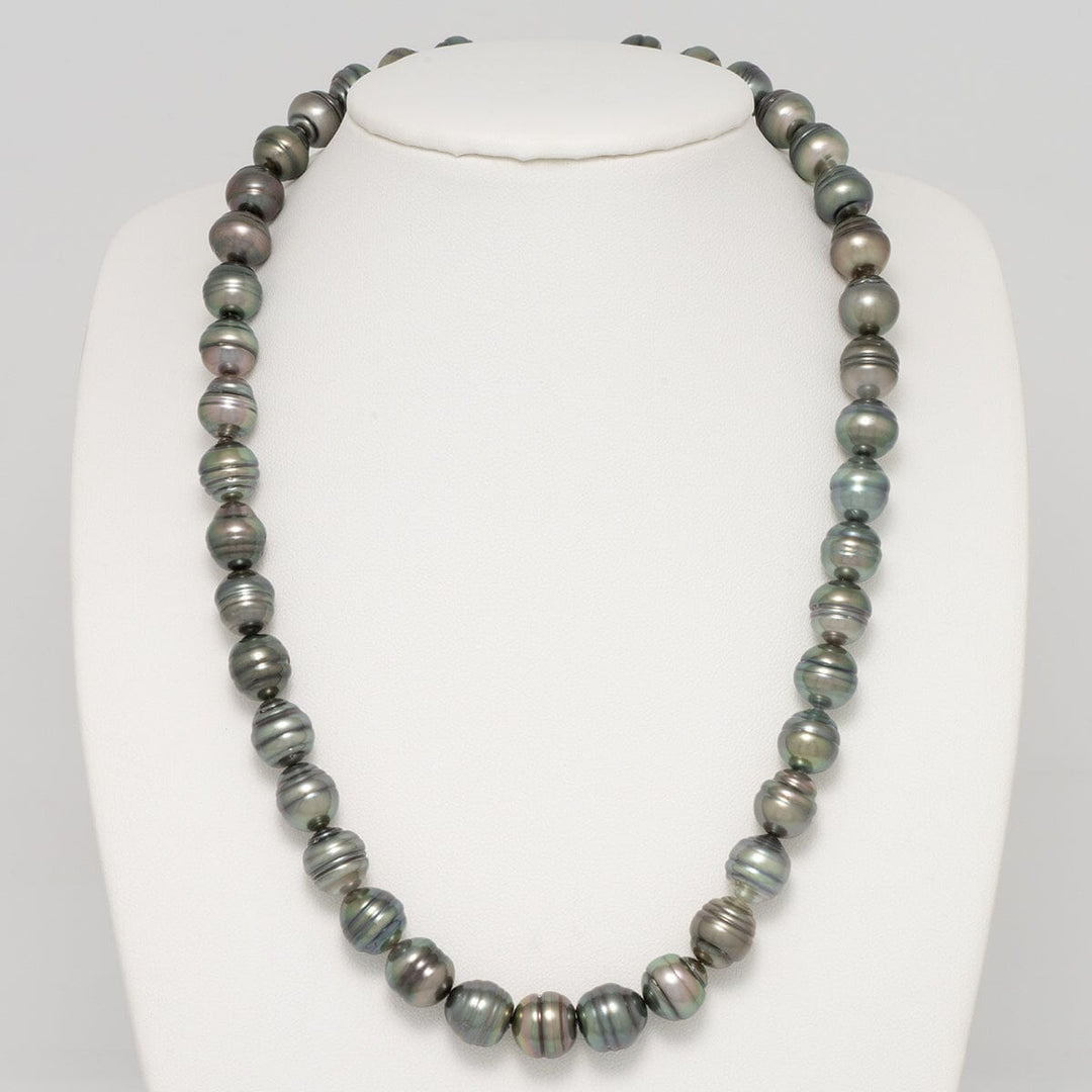 The pearls exhibit tight circling, which lends to the colorful combinations you see in the individual pearls. They exhibit green, peacock, hints of blue and more.