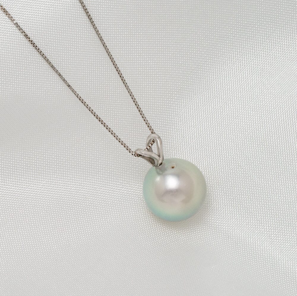 TK4-B: 10-10.5 mm Special Color Akoya Drop Pearl Unity Pendant featuring a lustrous round pearl with subtle iridescent hues on a delicate silver chain, perfect for elegant wear.