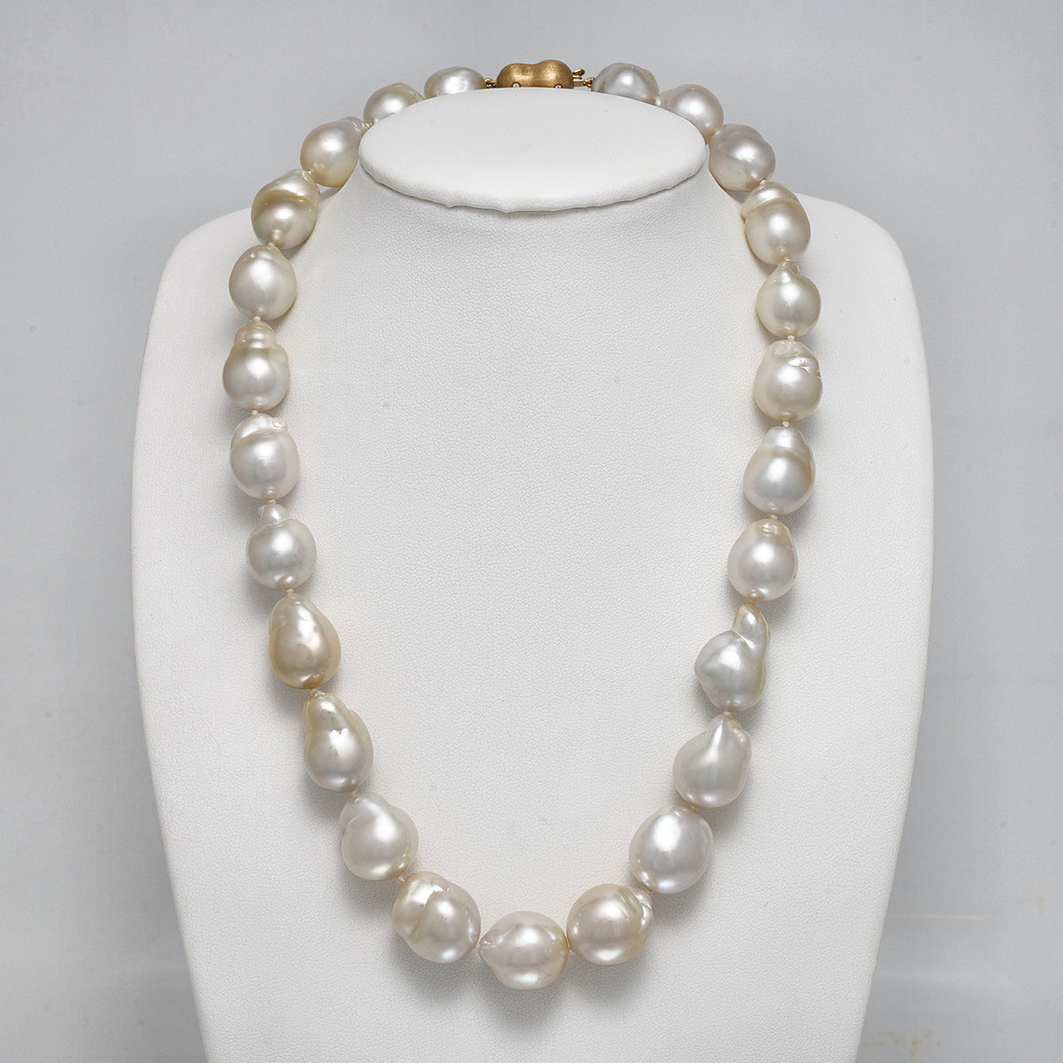 12.0-15.1 mm AAA Baroque White South Sea Pearl Necklace on a dark background
