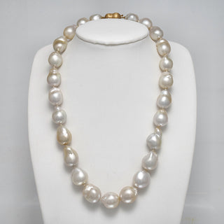 12.0-15.1 mm AAA Baroque White South Sea Pearl Necklace on a dark background