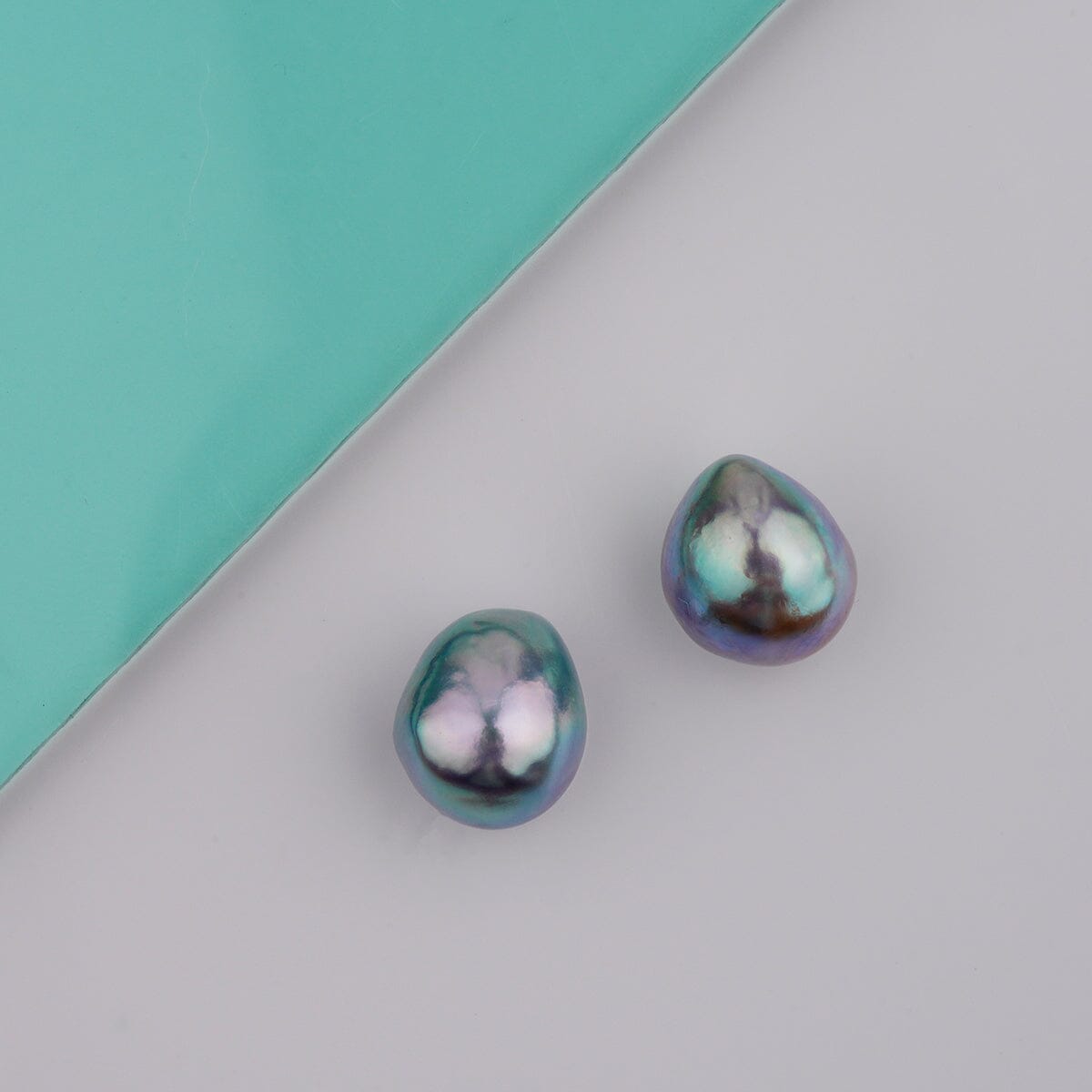 B-9: 9.0-9.5 mm Baroque Blue Akoya Pearl Pairs featuring unique irregular shapes and lustrous deep blue tones, perfect for fine pearl jewelry collections.