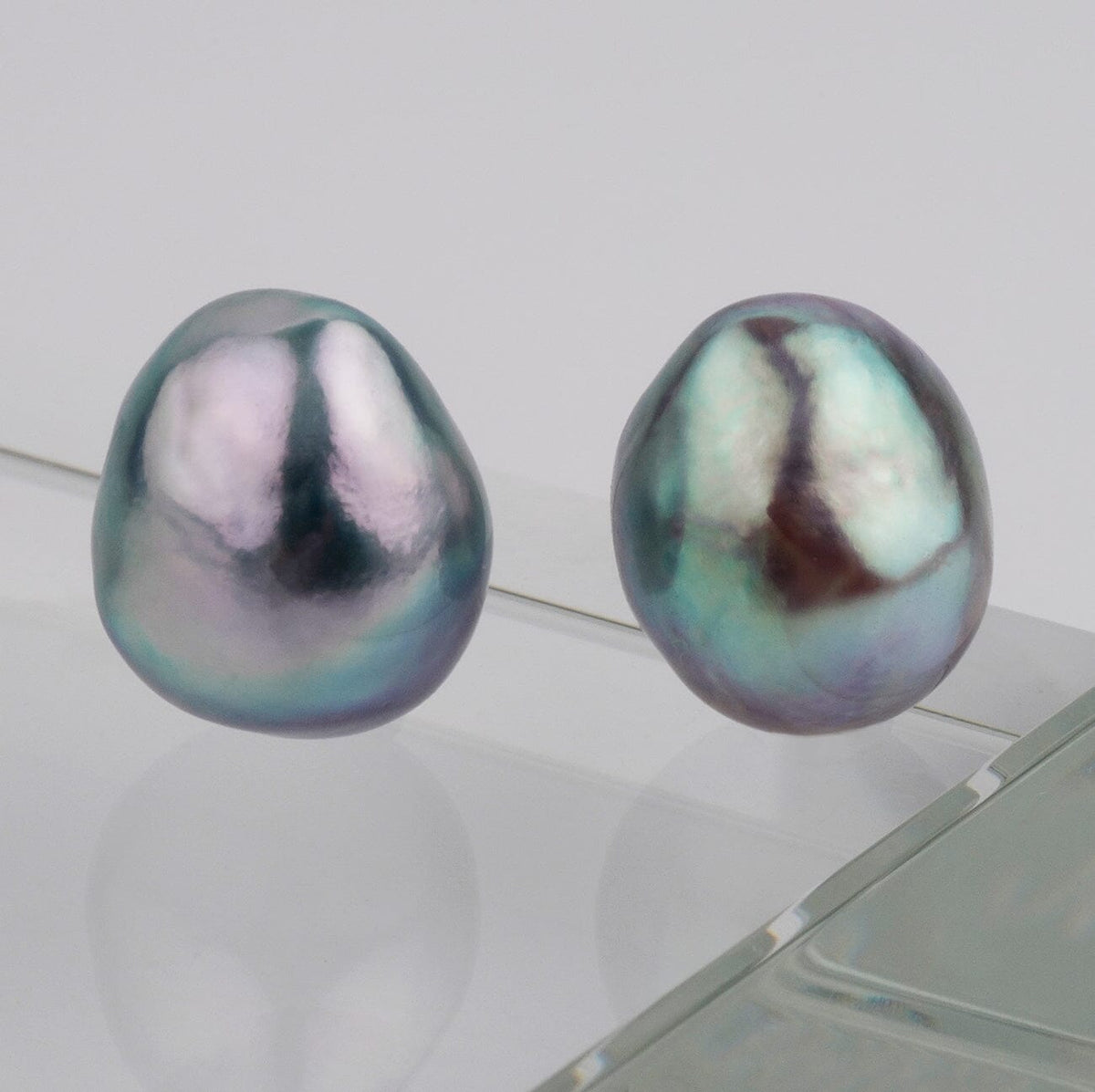 B-9: 9.0-9.5 mm Baroque Blue Akoya Pearl Pairs with unique irregular shapes and lustrous iridescent blue-green hues, perfect for elegant pearl jewelry designs.