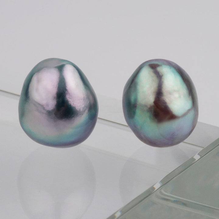 B-9: 9.0-9.5 mm Baroque Blue Akoya Pearl Pairs with unique irregular shapes and lustrous iridescent blue-green hues, perfect for elegant pearl jewelry designs.