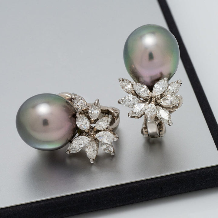 Assael Collection: 12.7–15.1 mm Tahitian Pearl and Diamond Earrings featuring lustrous black Tahitian pearls accented with sparkling marquise-cut diamonds in a floral design.