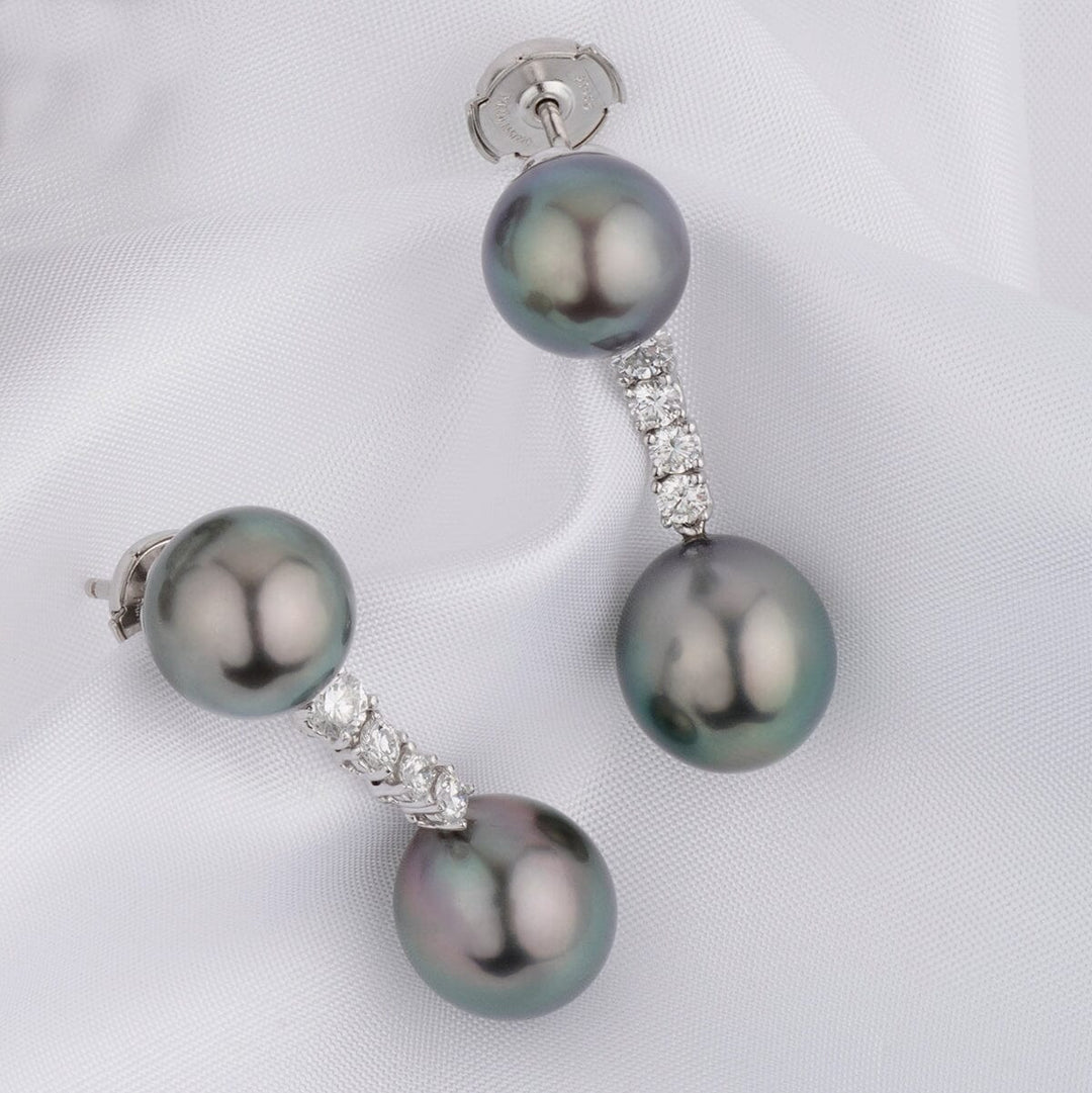 Assael Collection: 10.4–11.2 mm Tahitian Pearl and Diamond Earrings featuring lustrous black Tahitian pearls accented with a curve of sparkling diamonds on a silver setting.