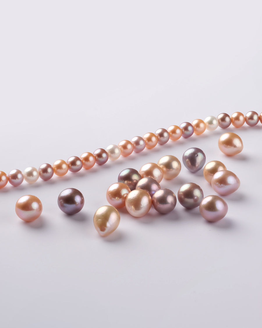 Dark natural-color freshwater pearls in bronze, copper and deep purple tones