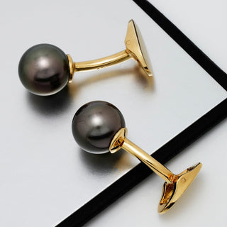 Assael Collection: 11.0 mm Tahitian Pearl Cufflinks featuring lustrous black pearls set on polished gold tone metal with a sleek and elegant design.