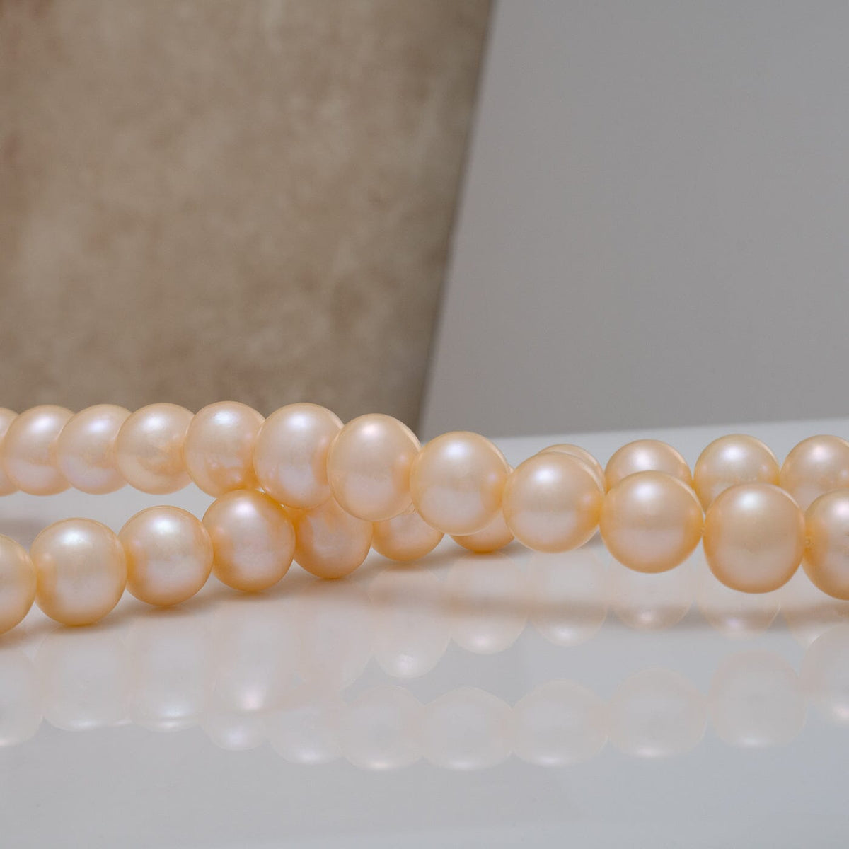 Large 10.5–11.5 mm AA+ pink freshwater pearl necklace with natural color and bright luster.