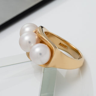 Assael Collection: 8.0–8.5 mm Akoya Three-Pearl Ring featuring three lustrous white akoya pearls set on a polished gold band, showcasing elegant and timeless cultured pearls.
