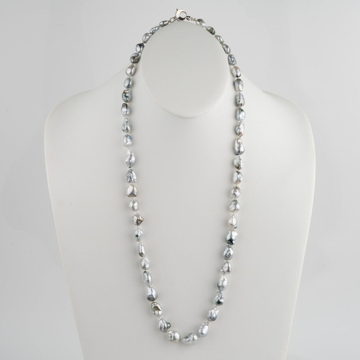 Assael Collection: 9.9–13.0 mm Fijian Pearl Keshi Necklace featuring lustrous irregular gray-white pearls elegantly strung on a 14K white gold clasp, perfect for fine pearl jewelry lovers.