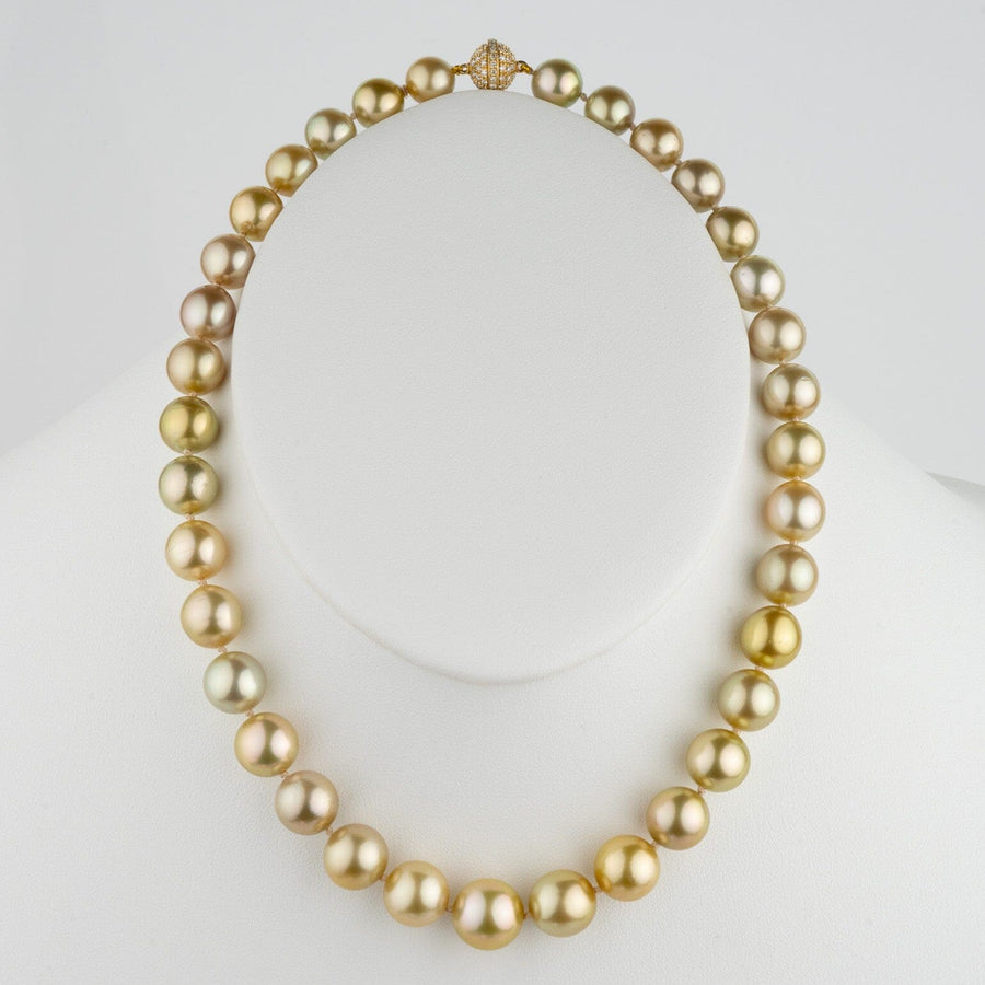 Assael Collection: 9.3–12.8 mm Fijian Pearl Necklace featuring a strand of lustrous multi-toned pearls with gold clasps displayed on a white bust.
