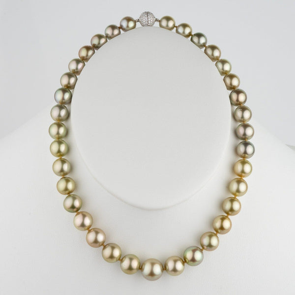 Assael Collection: 10.0–12.9 mm Fijian Pearl Necklace featuring large, lustrous cultured pearls in shades of gold and green with a decorative clasp on a white display bust.